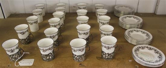 Set of 21 Hammersley coffee cans and saucers, 8 with matched silver holders (London 1905, Army & Navy)